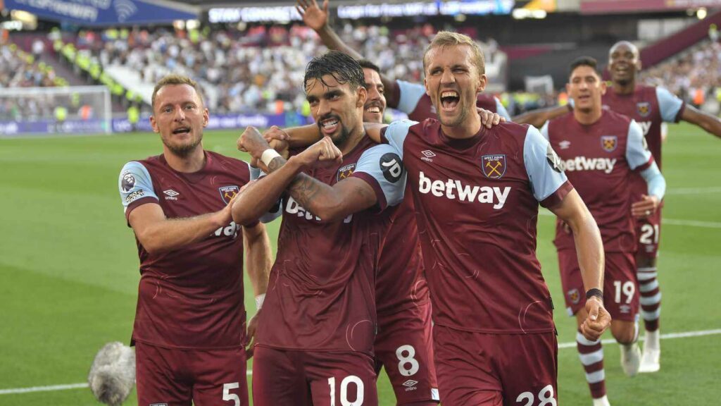 West ham united players celebrate after scoring a goal