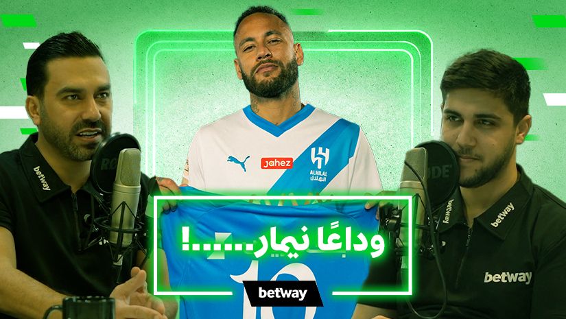 Three men are in a studio with microphones. The center man, donning a football jersey, proudly displays a shirt with the number 10. A green backdrop features Arabic text, while those flanking him sport Betway Arabia-branded shirts.
