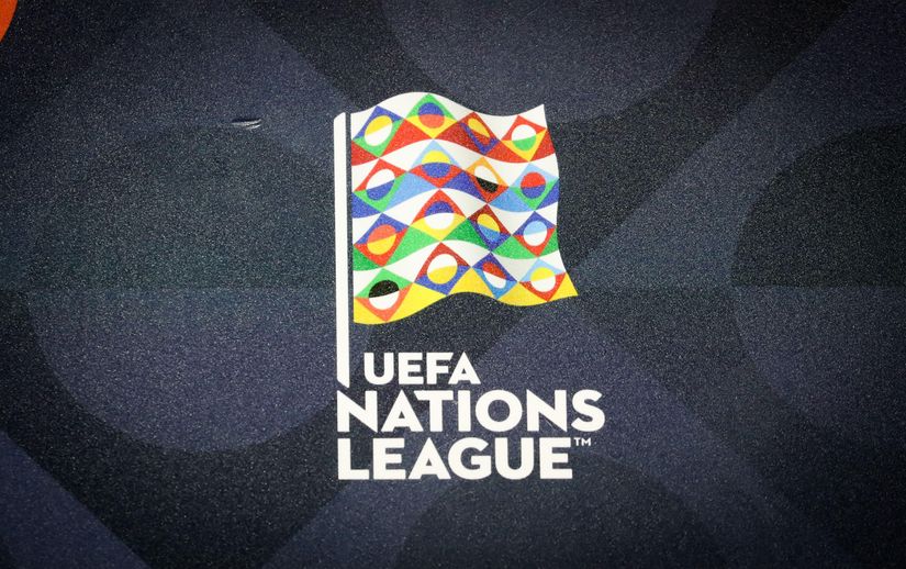 A colorful flag design with interwoven patterns floats above the UEFA Nations League text on a dark background, reminiscent of Betways dynamic branding.